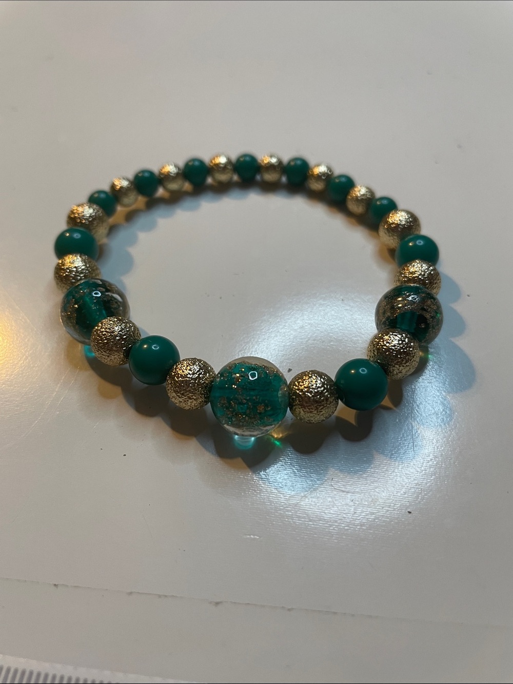 Green and Gold Beaded Stretch Bracelet - Brand Unspecified